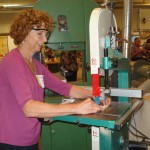 Teachers use table saw to cut tiles to make Fraction Contraption at Sierra STEM Academy