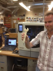 Tom Stargaard, Del Oro High School teacher, shows product made with new 3D printer provided by Sierra College STEM Collaborative.